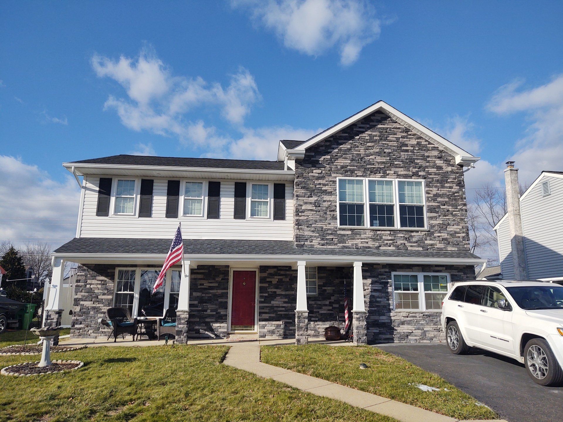 Kingsford gray ledgestone house