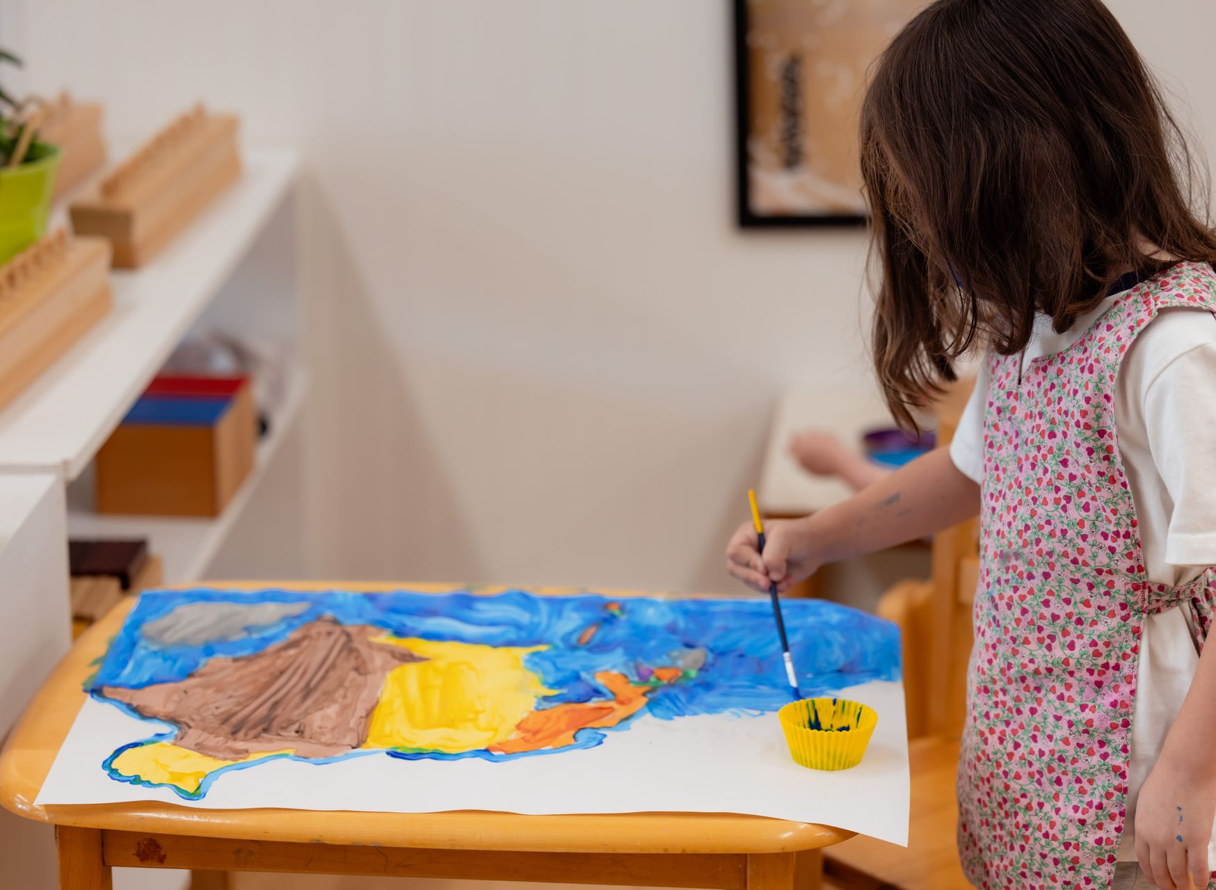 Montessori child painting