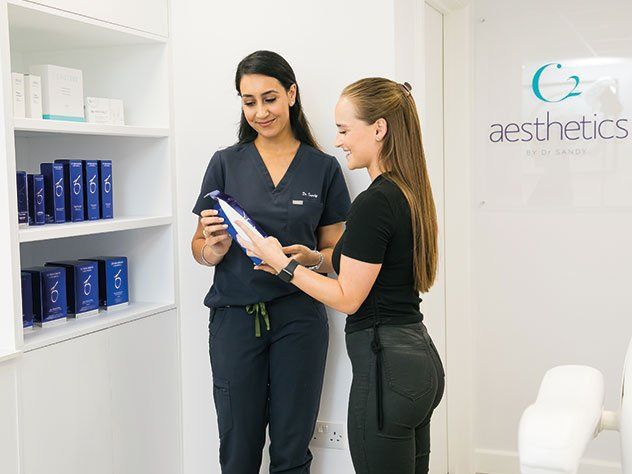 Patient looking at Obagi Skincare products