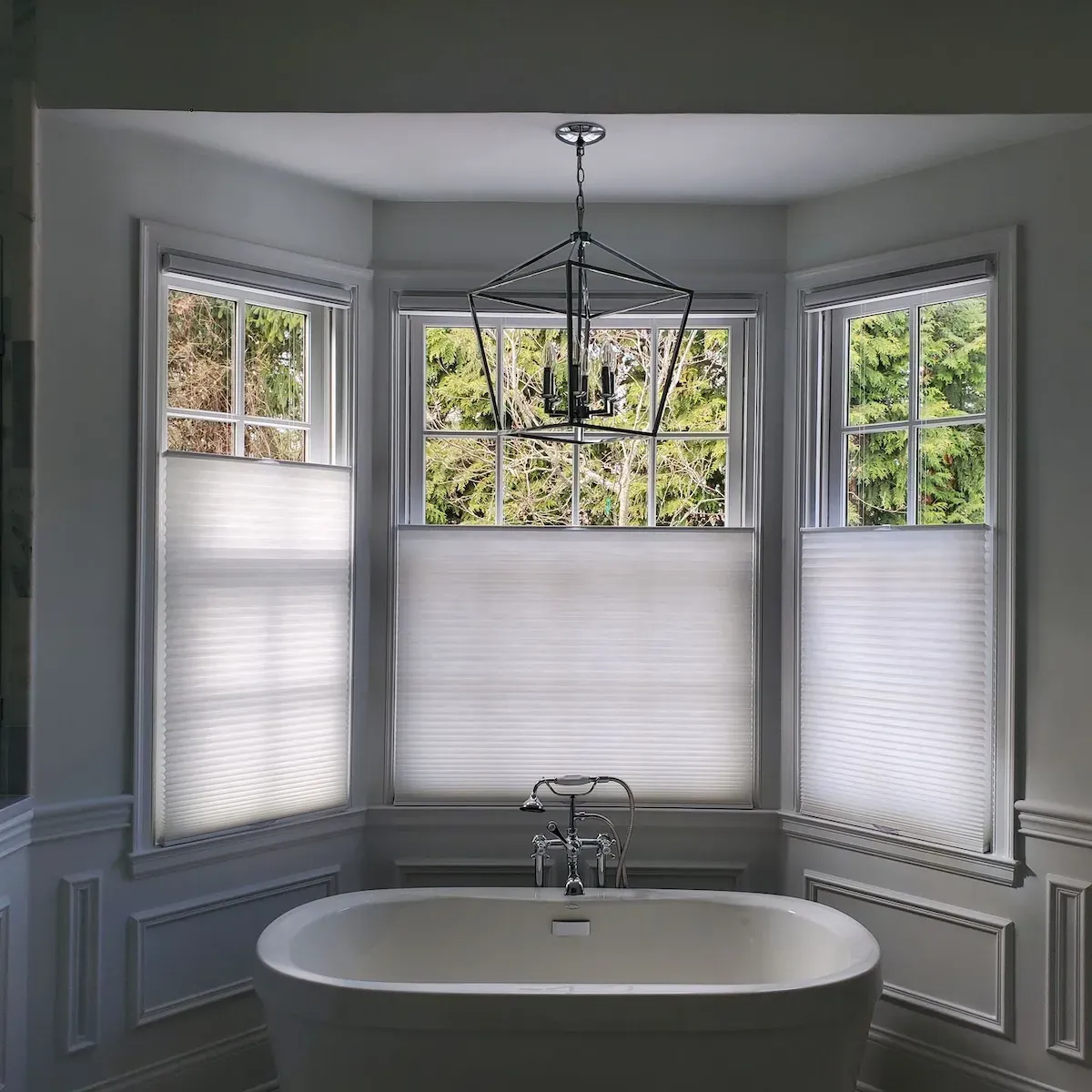 The image shows cellular shades in a Top Down/Bottom Up configuration. The shades are beige and allow for both privacy and natural light control.