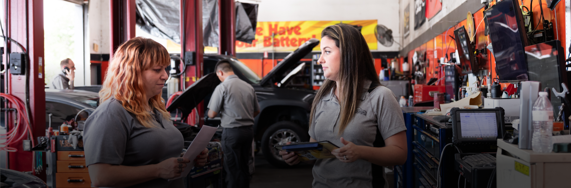 Our Staff Talking Each Other - CarDoc Automotive 