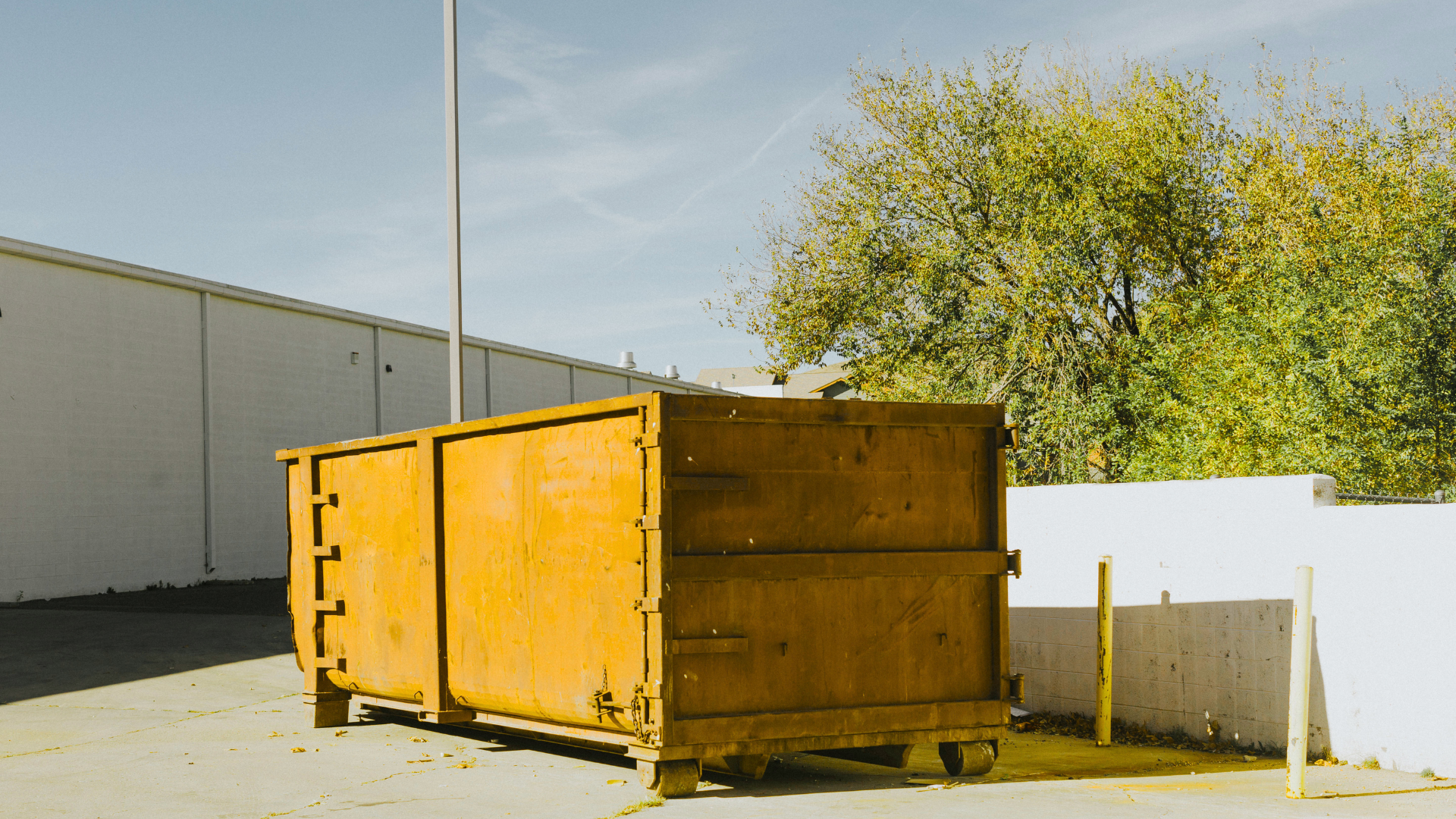 Heavy duty dumpster used during commercial building renovation