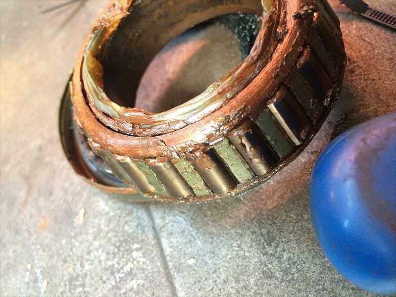 A Close Up of a Bearing on a Table Next to a Blue Ball — Hastings River Brake & Exhaust in Port Macquarie, NSW
