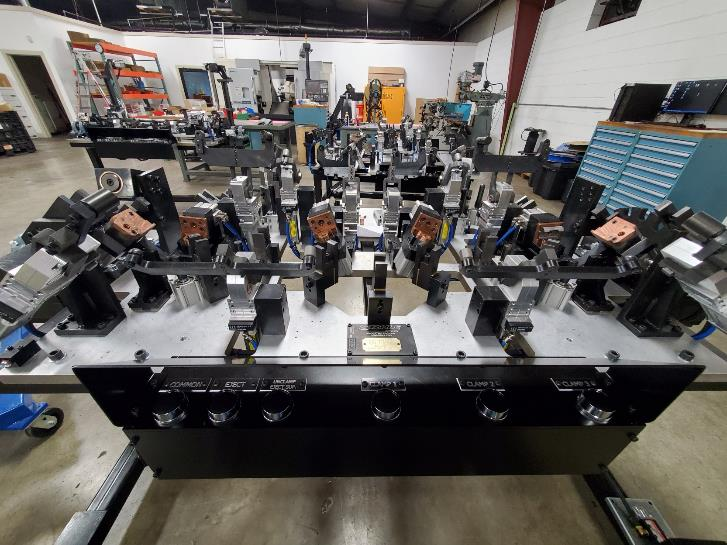 An industrial manufacturing machine with various components.