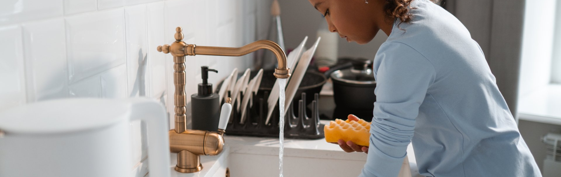 Girl Washing Dishes