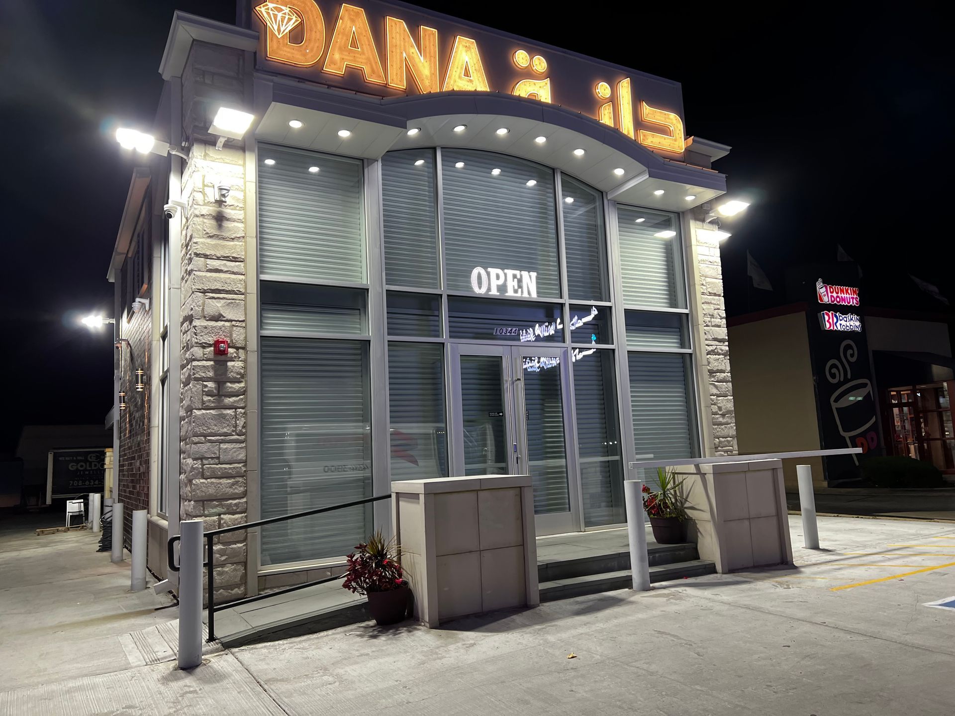 Store With Glass And Security Shutter — Chicago, IL — National Shutter System