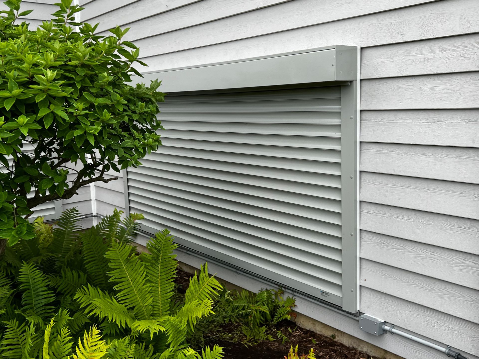 Security Shutter Installed Near The Plants — Chicago, IL — National Shutter System