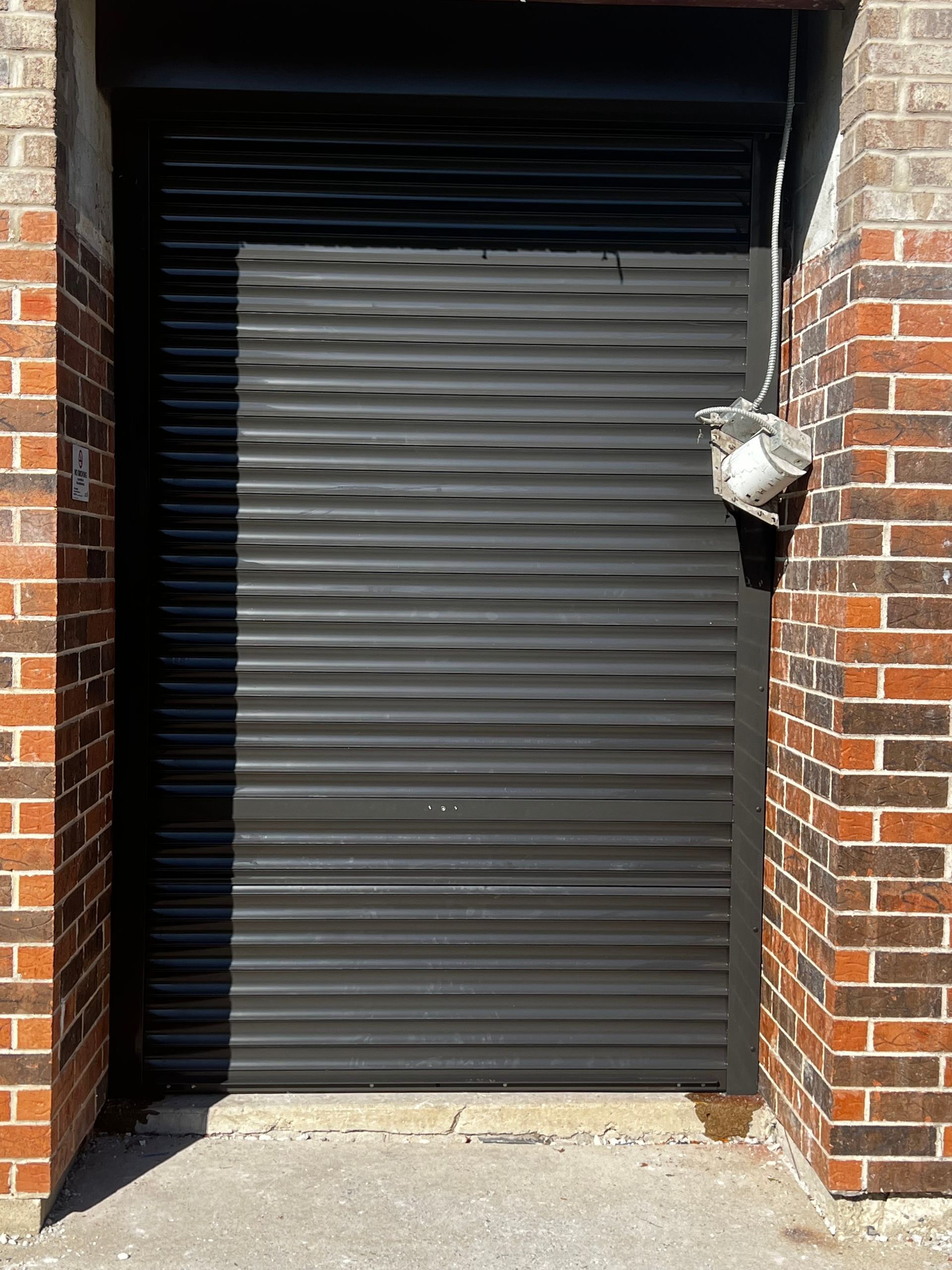 Shutter Screen Between The Brick Posts — Chicago, IL — National Shutter System