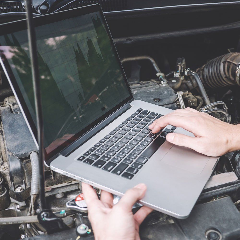 Laptop on Top of The Engine — Wellington, CO — Mountain View Automotive LLC