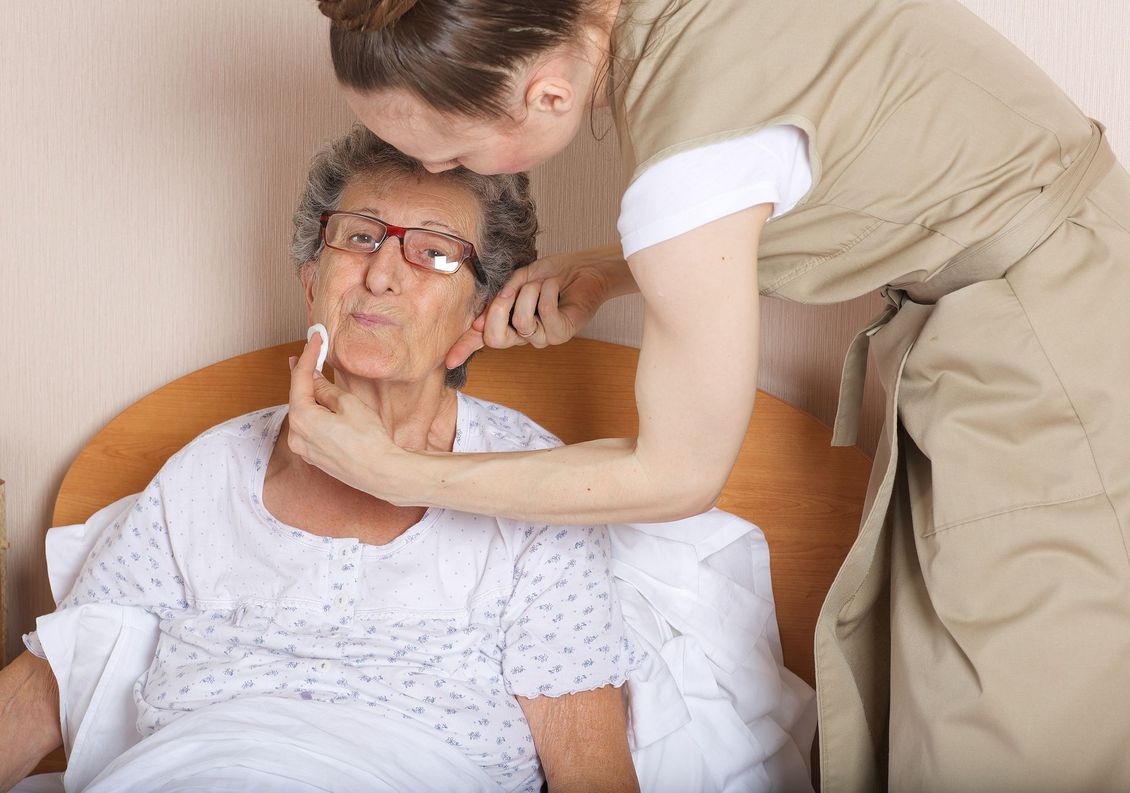 hospice patient receiving personal care from a hospice aide