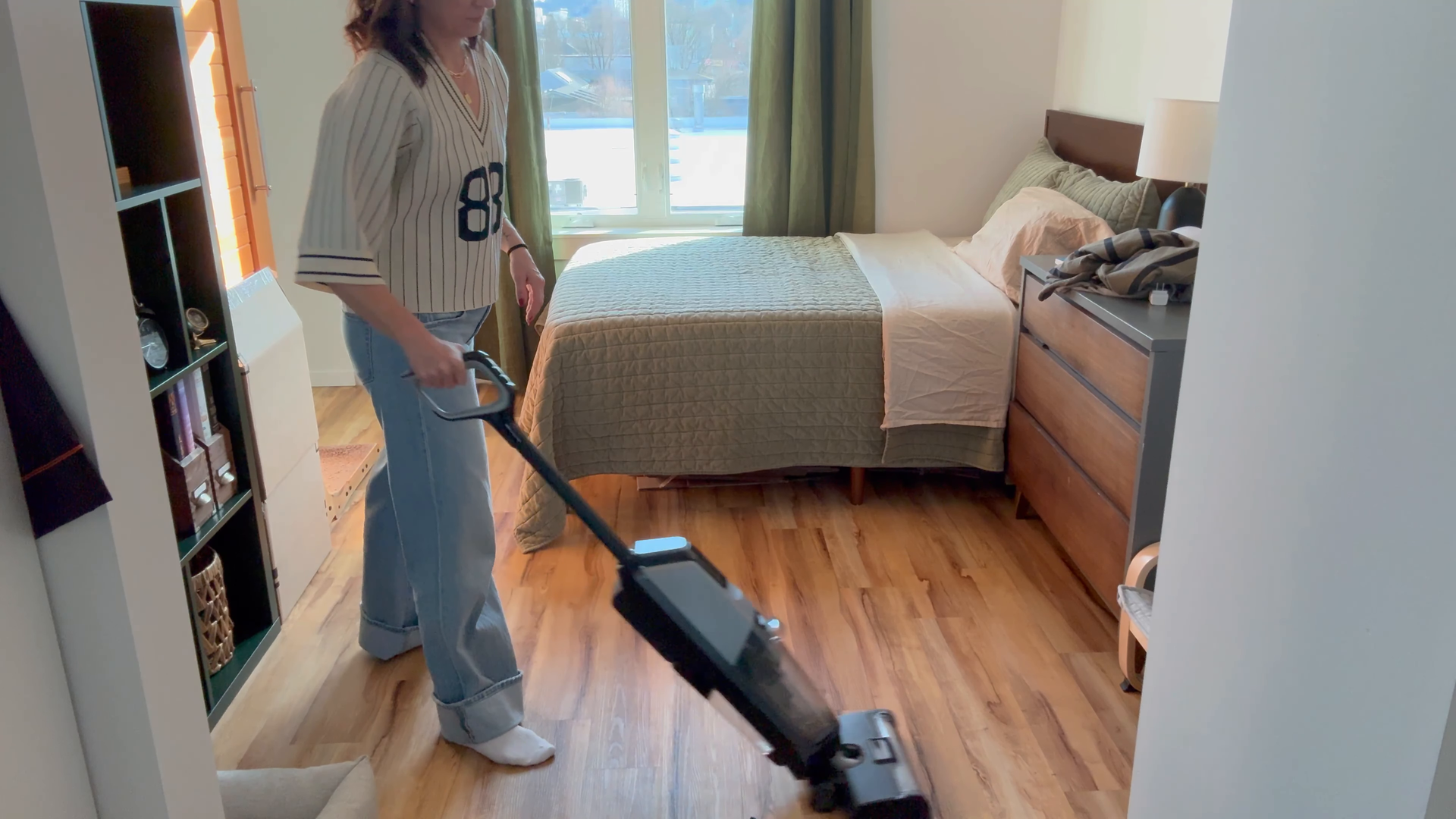 Tile and grout being scrubbed in a bathroom