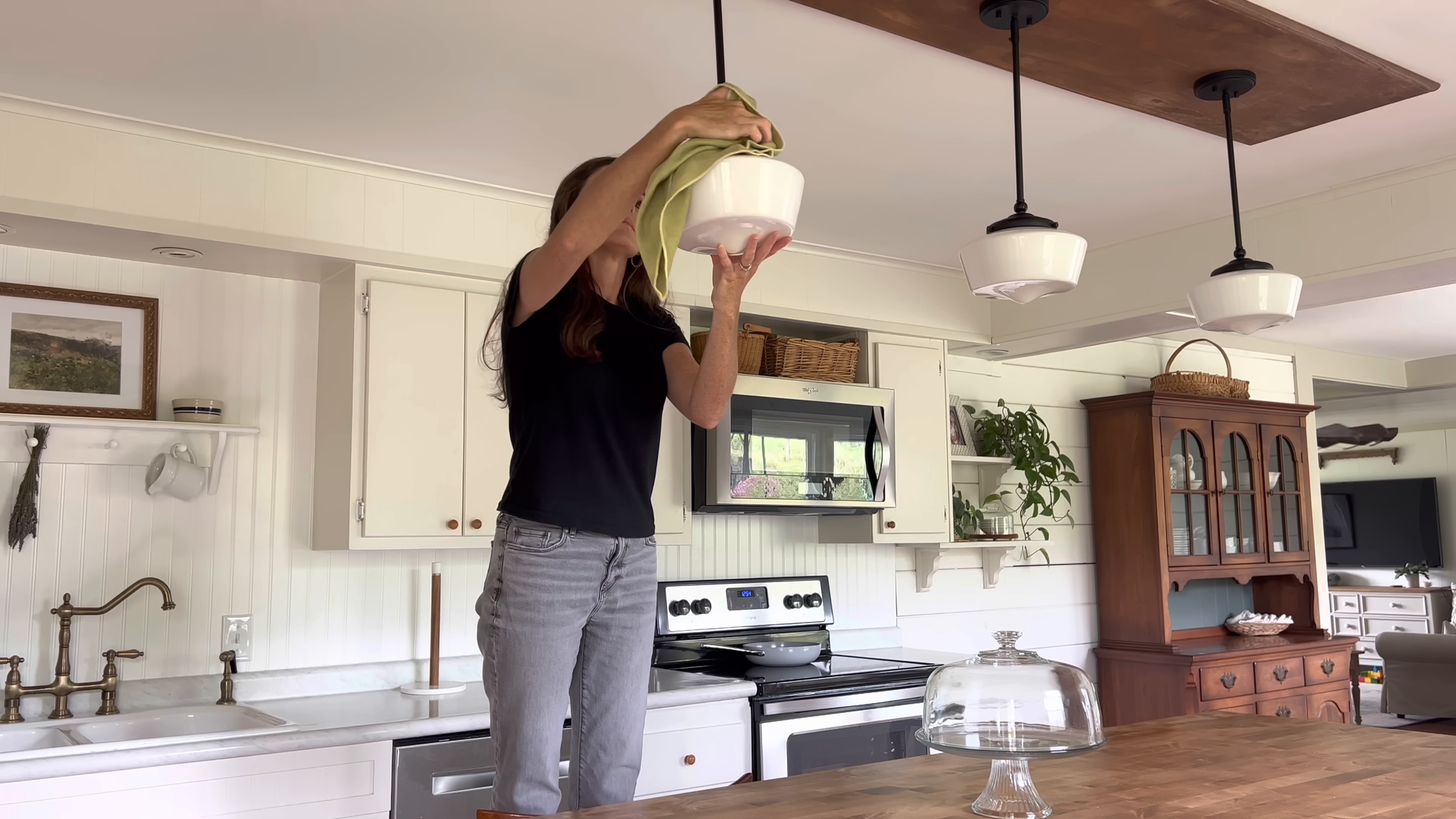 Cleaner working through a Forest Hills apartment