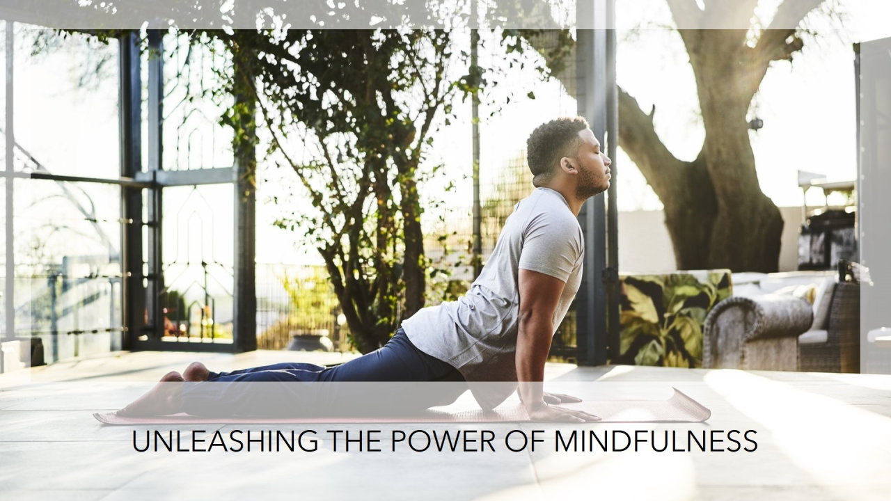 A man is doing a yoga pose on a yoga mat.
