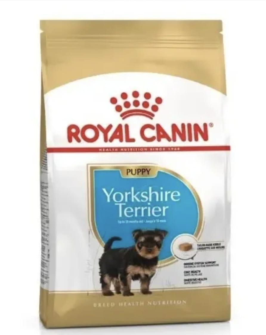 Bolsa de comida para cachorros Royal Canin Yorkshire Terrier, color dorado y blanco con la imagen de un pequeño terrier.