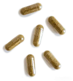 Six brown capsules on a white background