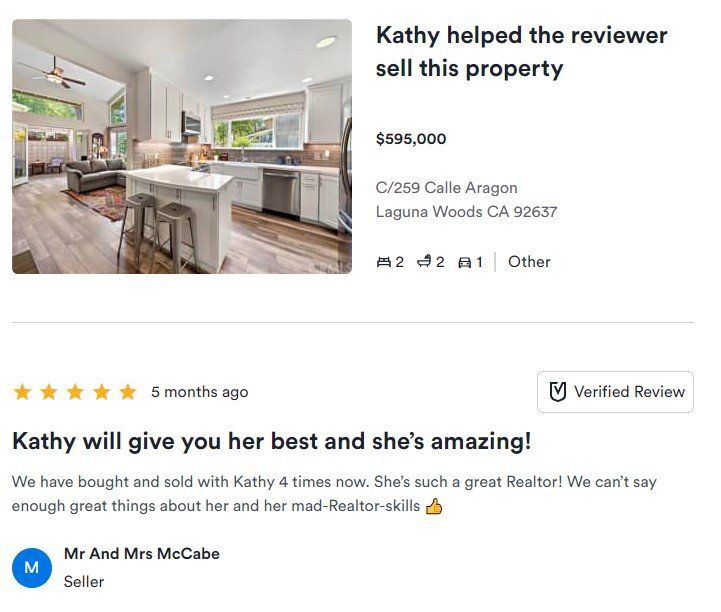 Real estate listing and review for a bright modern kitchen and dining space, praising Kathy as an agent