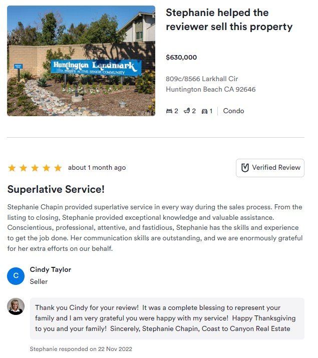 Superlative Service review with 5 stars and a property sale featuring a painted stone sign