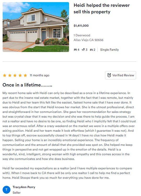 Screenshot of a 5-star review page for a white two-story house listing with text review and owner reply