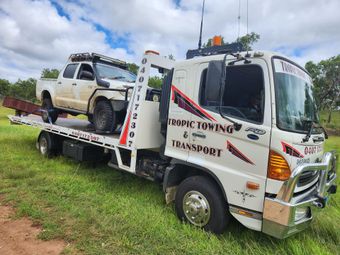Truck towing a car