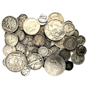 Assorted silver and tarnished coins piled together on a white background