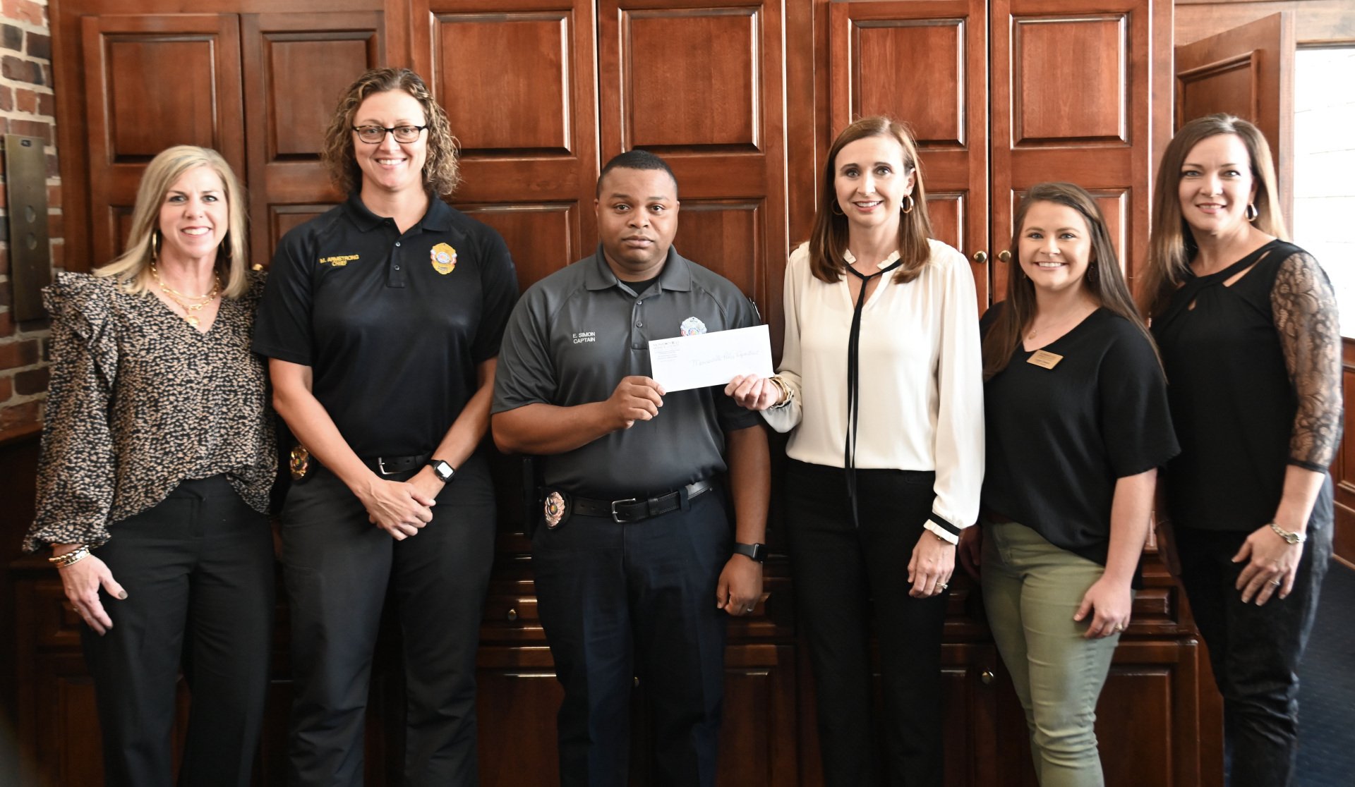 Chamber makes donation to Monroeville Police Department Program
