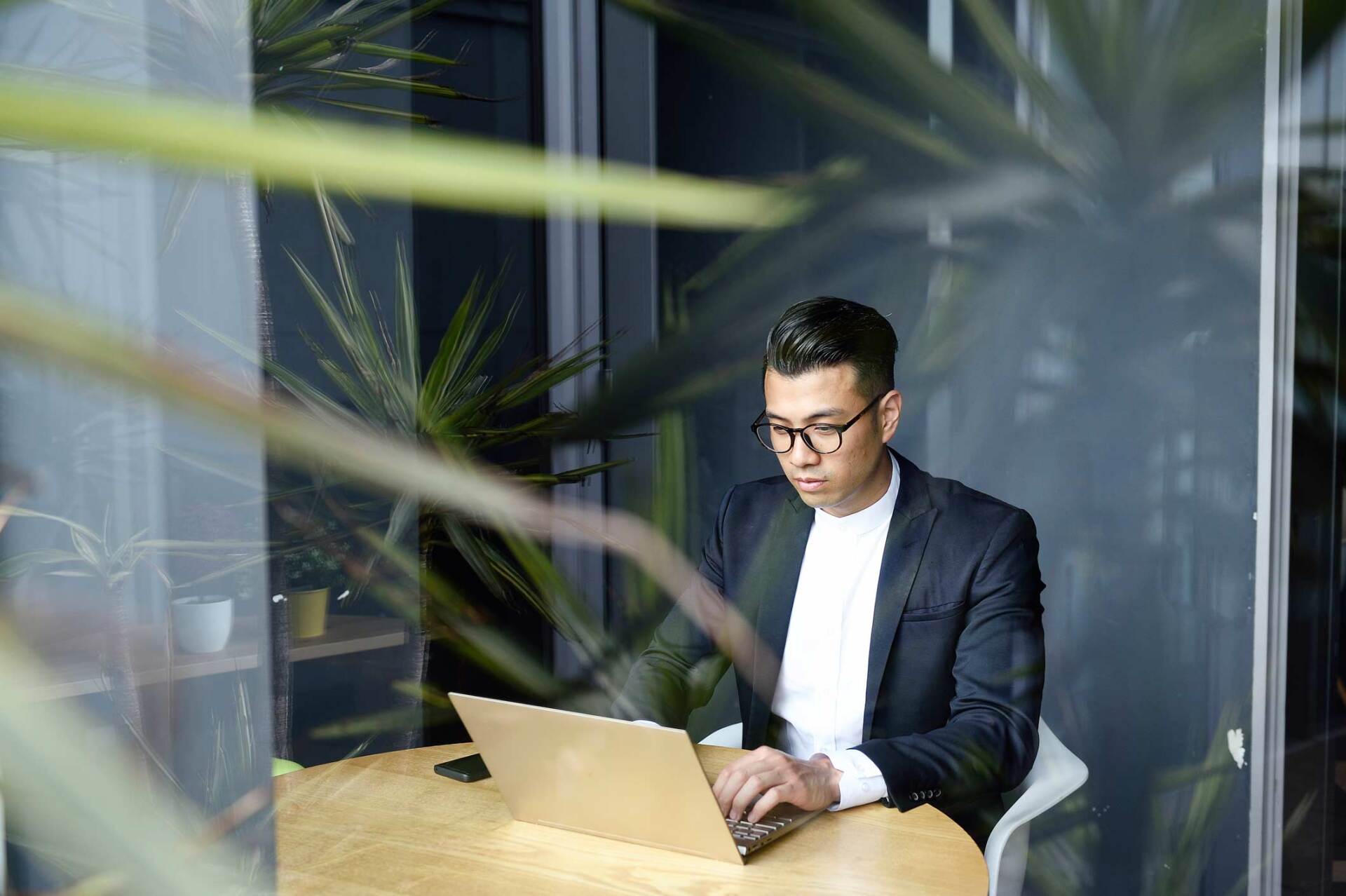 Young businessman using laptop — Jacksonville, FL — Beaches Family Law Young businessman using laptop — Jacksonville, FL — Beaches Family Law