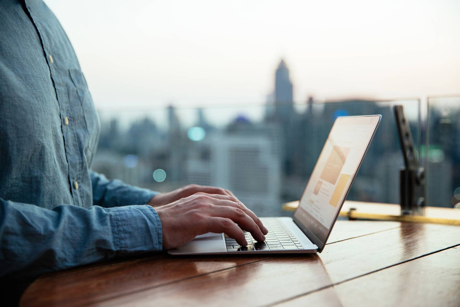 Person typing on laptop — Jacksonville, FL — Beaches Family Law Person typing on laptop — Jacksonville, FL — Beaches Family Law