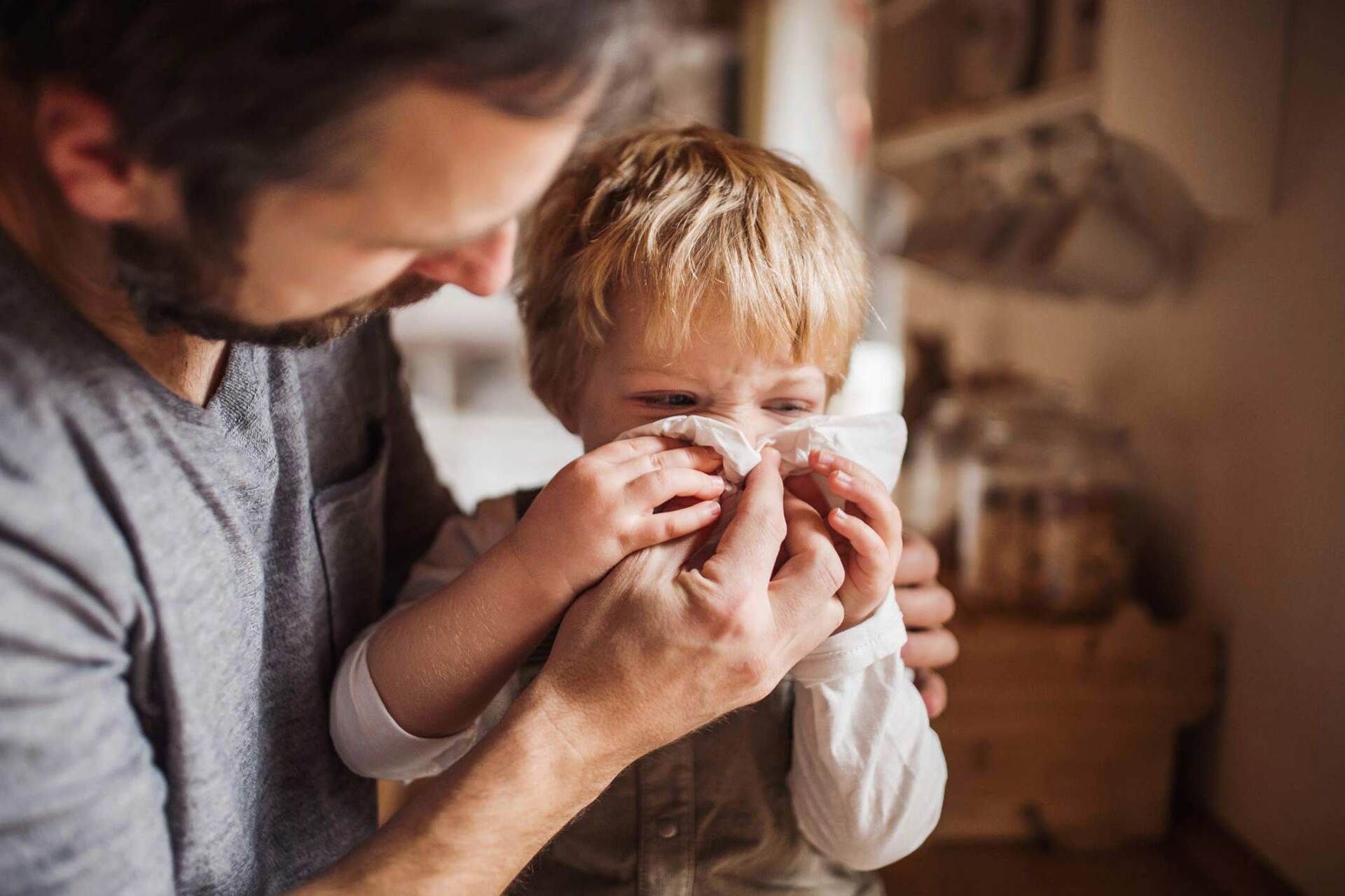 Father helping sick child — Jacksonville, FL — Beaches Family Law Father helping sick child — Jacksonville, FL — Beaches Family Law