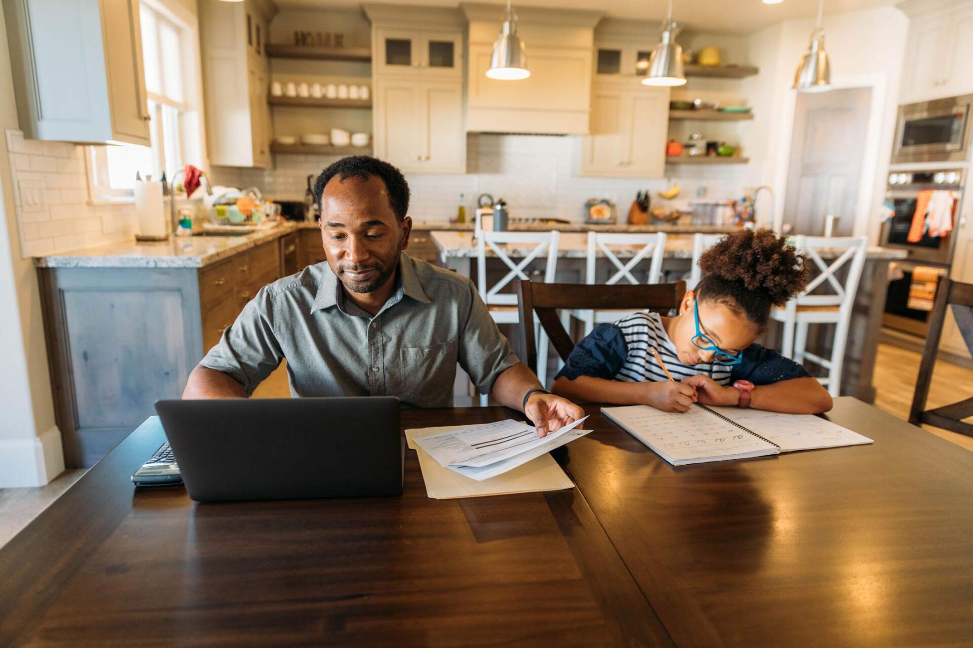 Father and daughter doing work next to each other — Jacksonville, FL — Beaches Family Law Father and daughter doing work next to each other — Jacksonville, FL — Beaches Family Law