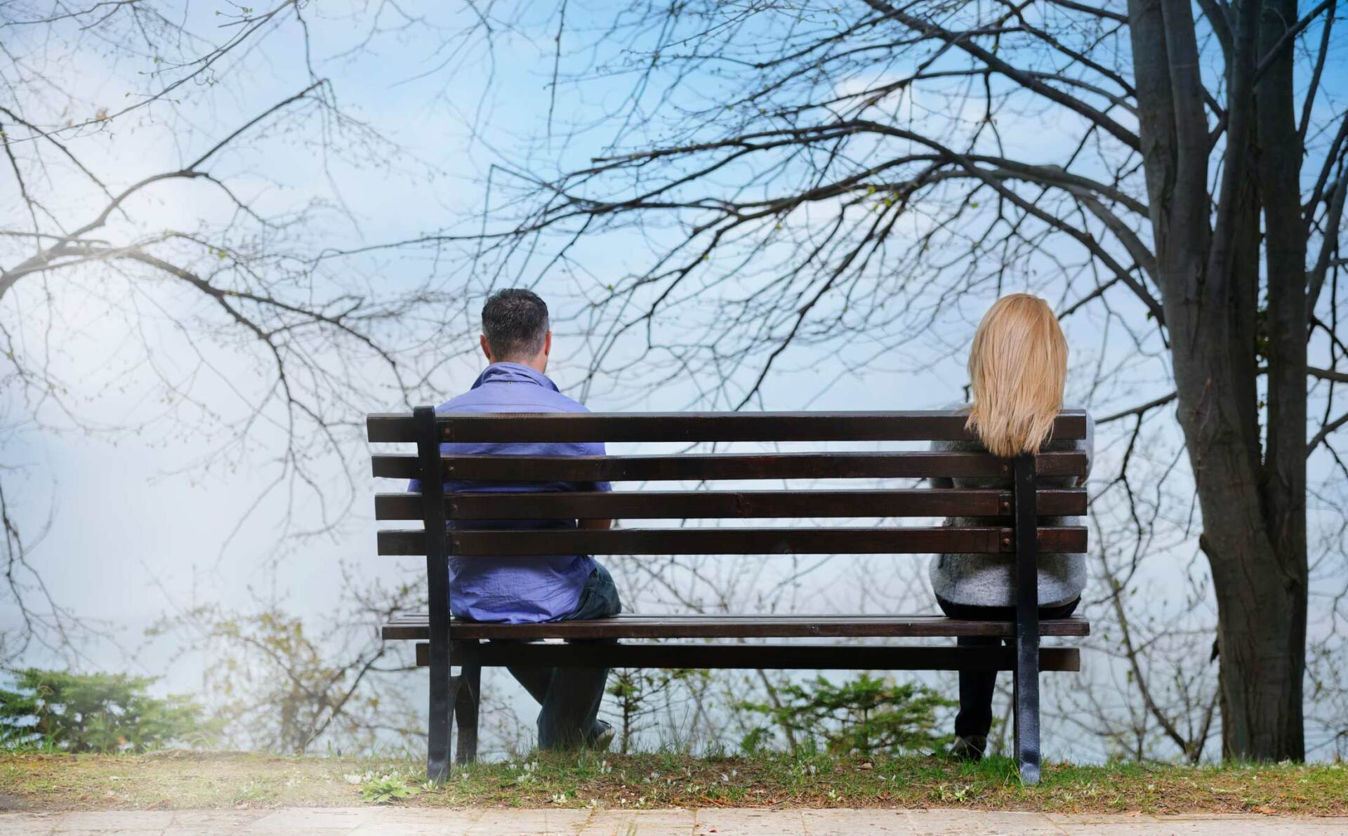 Man and woman on bench — Jacksonville, FL — Beaches Family Law Man and woman on bench — Jacksonville, FL — Beaches Family Law