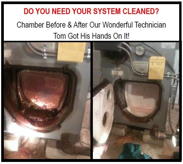 Person repairing a white furnace, holding tools inside the open cabinet.