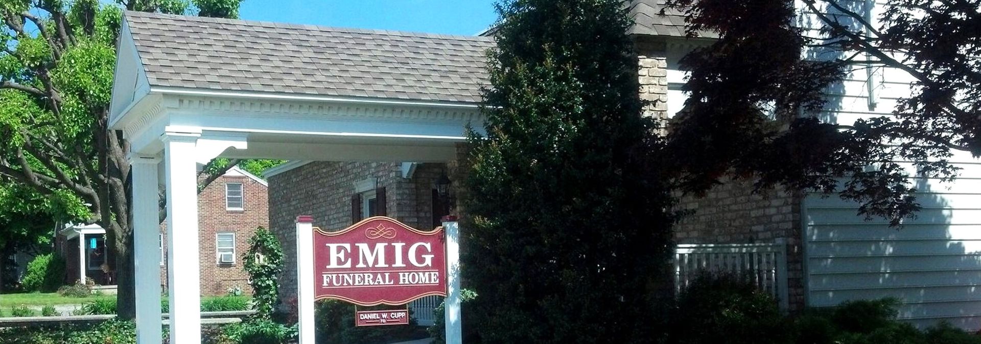 Emig Funeral Home sign and front portico