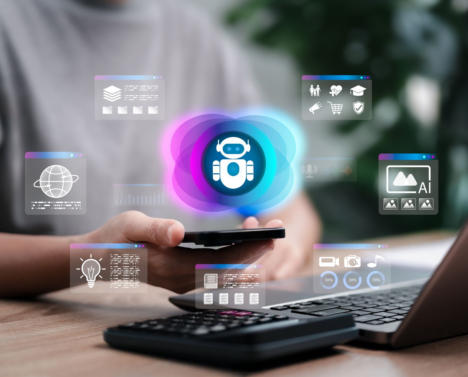 Person holding phone with holographic AI bot icon, laptop, calculator on desk.