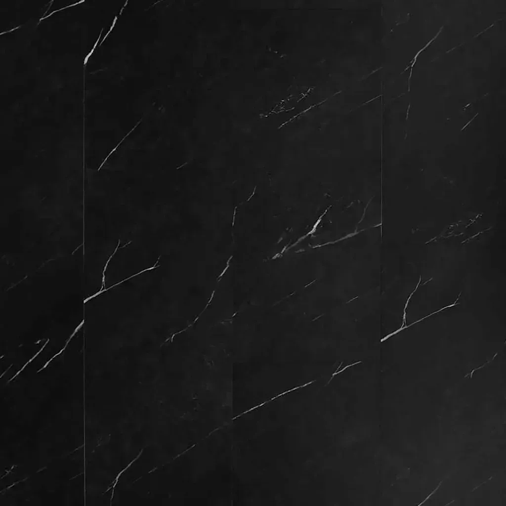 Superficie de mármol negro oscuro con sutiles vetas blancas y finos arañazos.