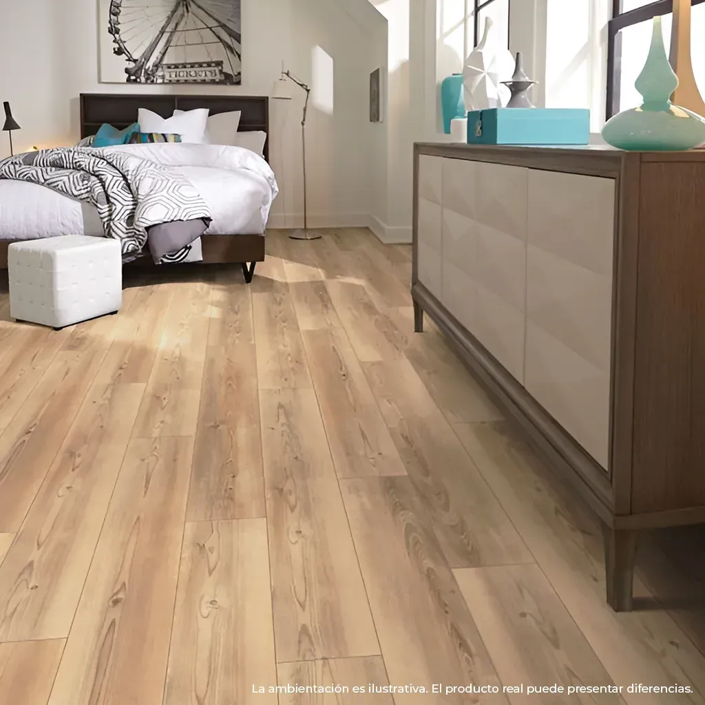 Dormitorio moderno con cama, suelo de madera, cómoda y cuadros en la pared.