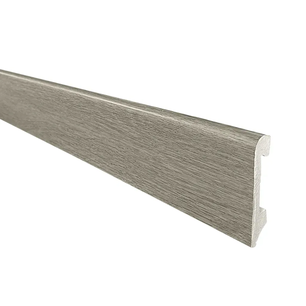 Primer plano de una superficie de madera gris con un borde blanco a la derecha.