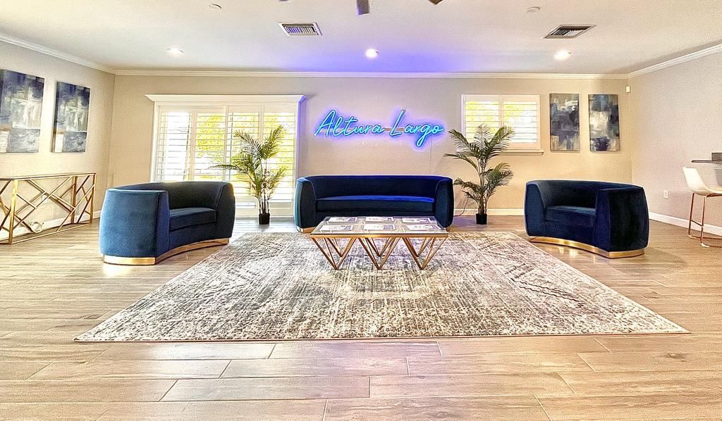 Blue lounge set within a leasing office