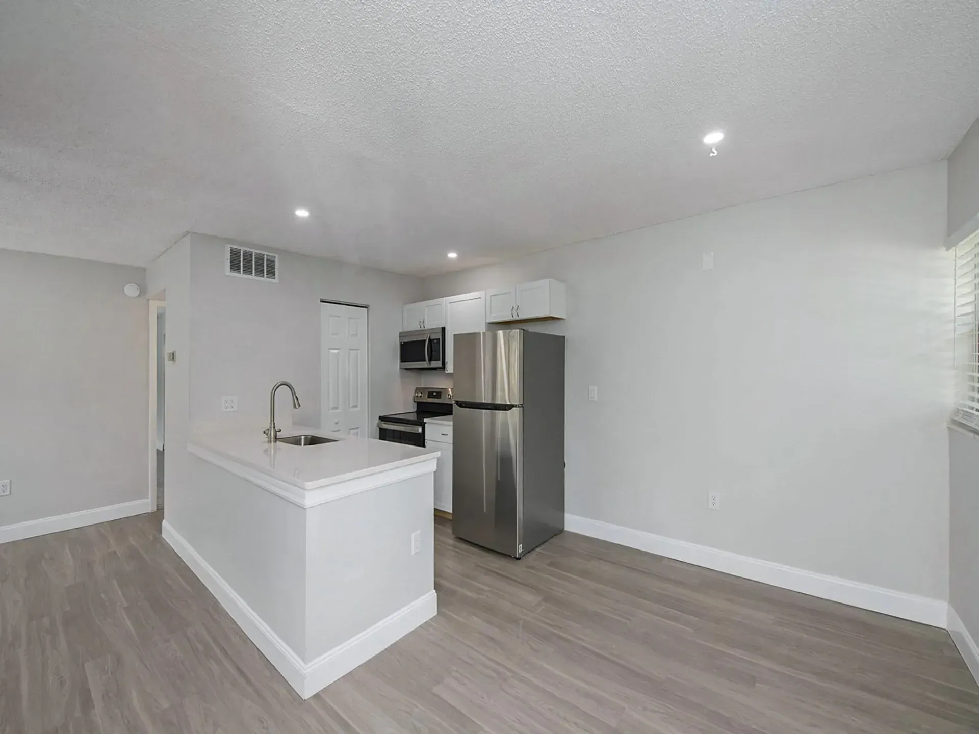 Modern kitchen with stainless steel appliances