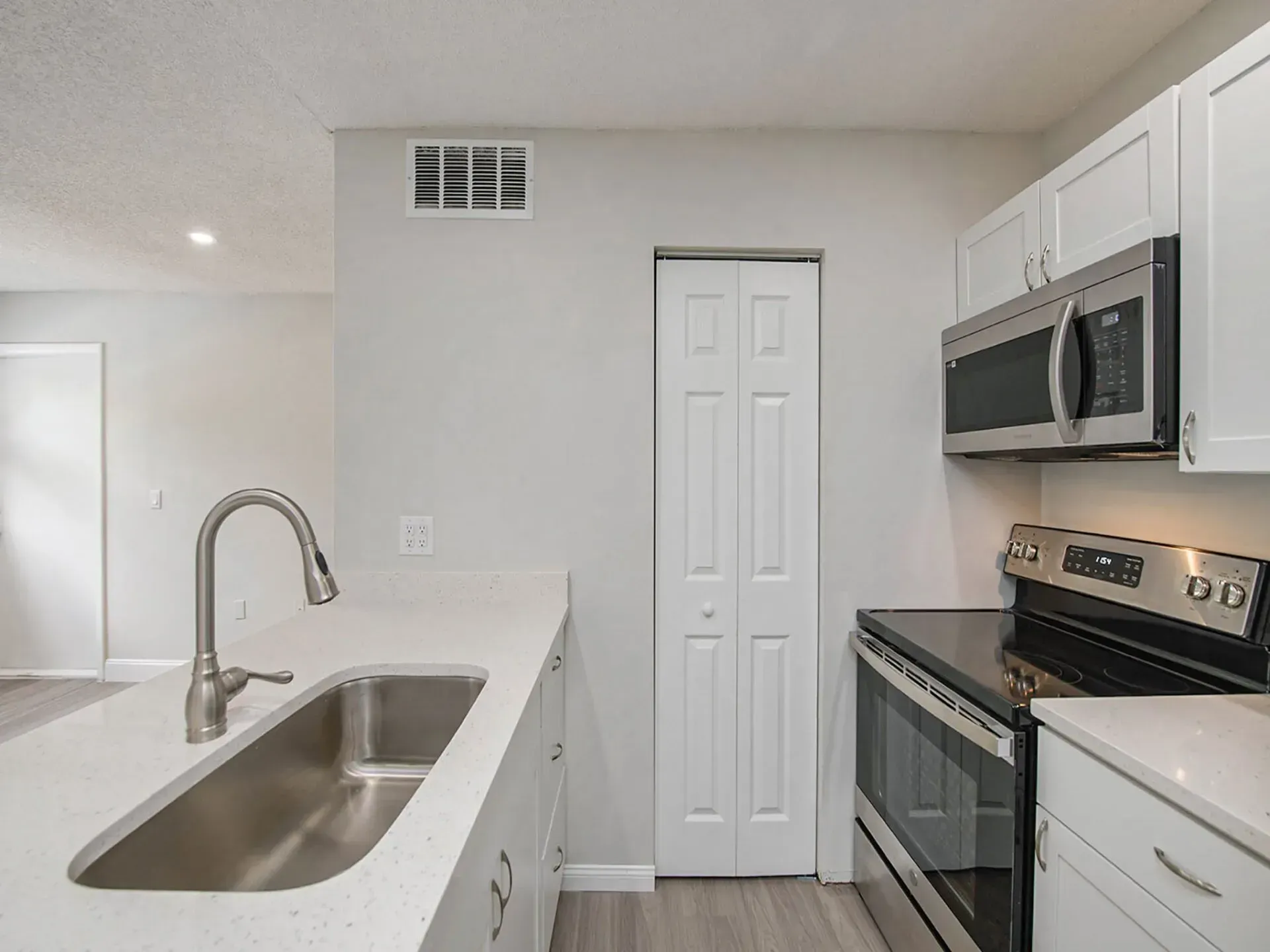 Modern kitchen with stainless steel appliances