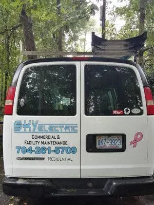 Back of a white van with 