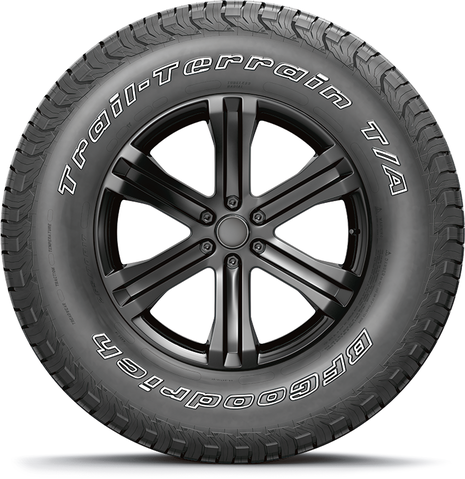 Black alloy wheel with a rugged tire on a white background