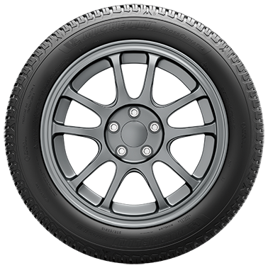 Black car tire with silver alloy wheel rim on a white background