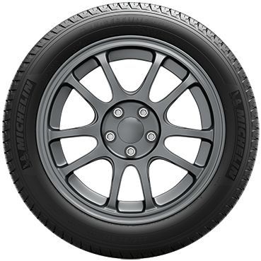 Black car tire with gray alloy rim on a white background