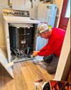 Keith working on appliances