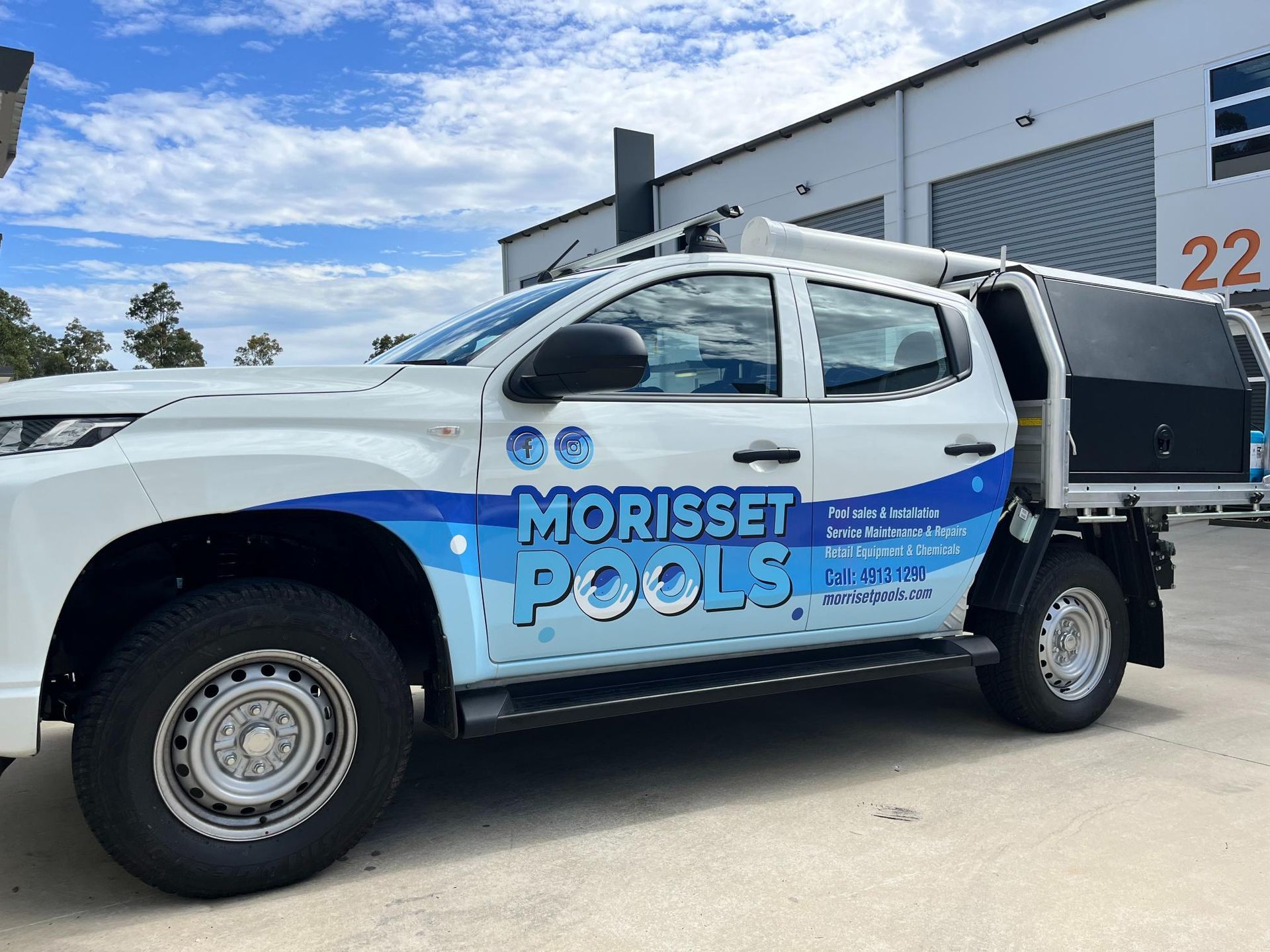 White and blue truck with 