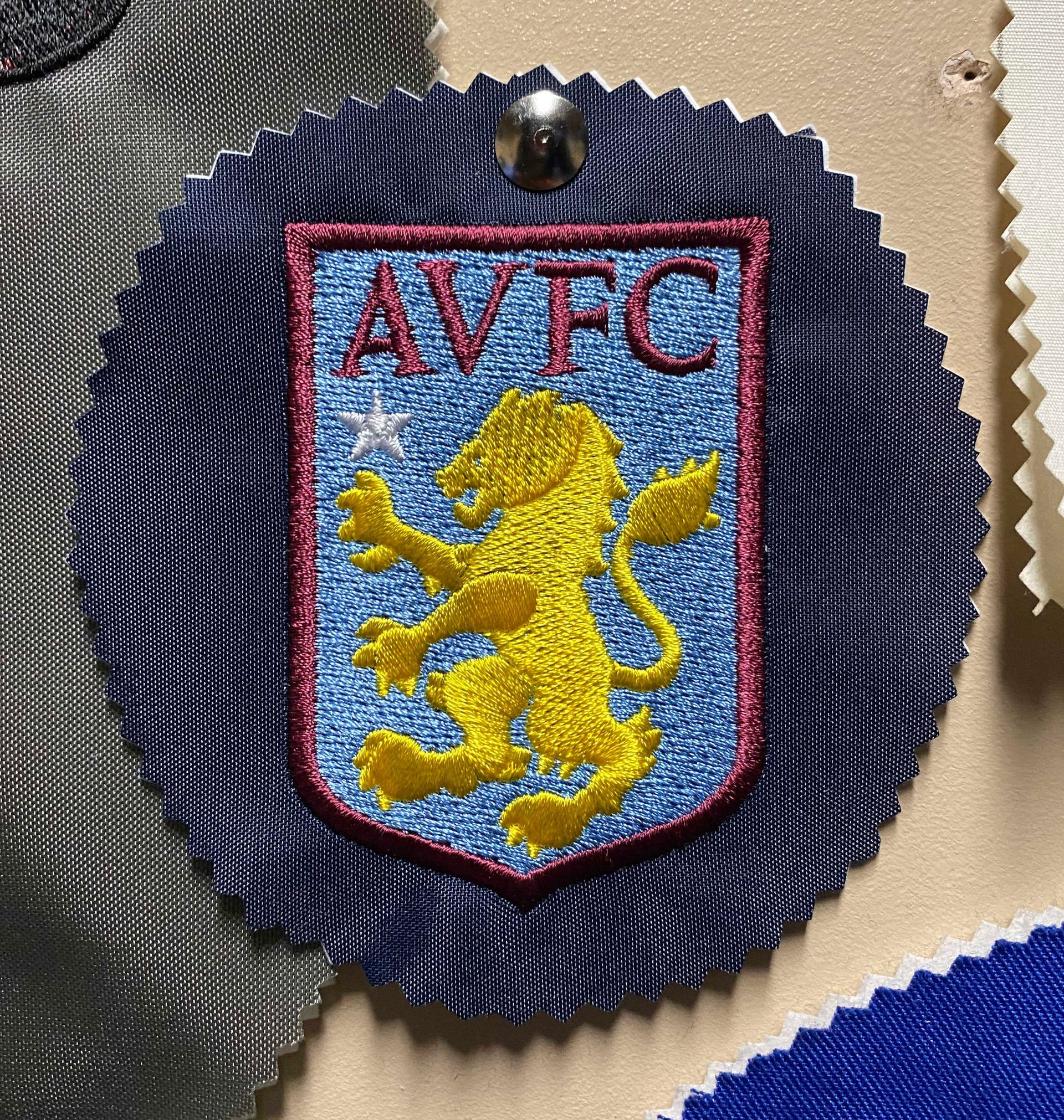 Aston Villa Football Club embroidered swatch, gold lion on light blue shield with burgundy border, and 