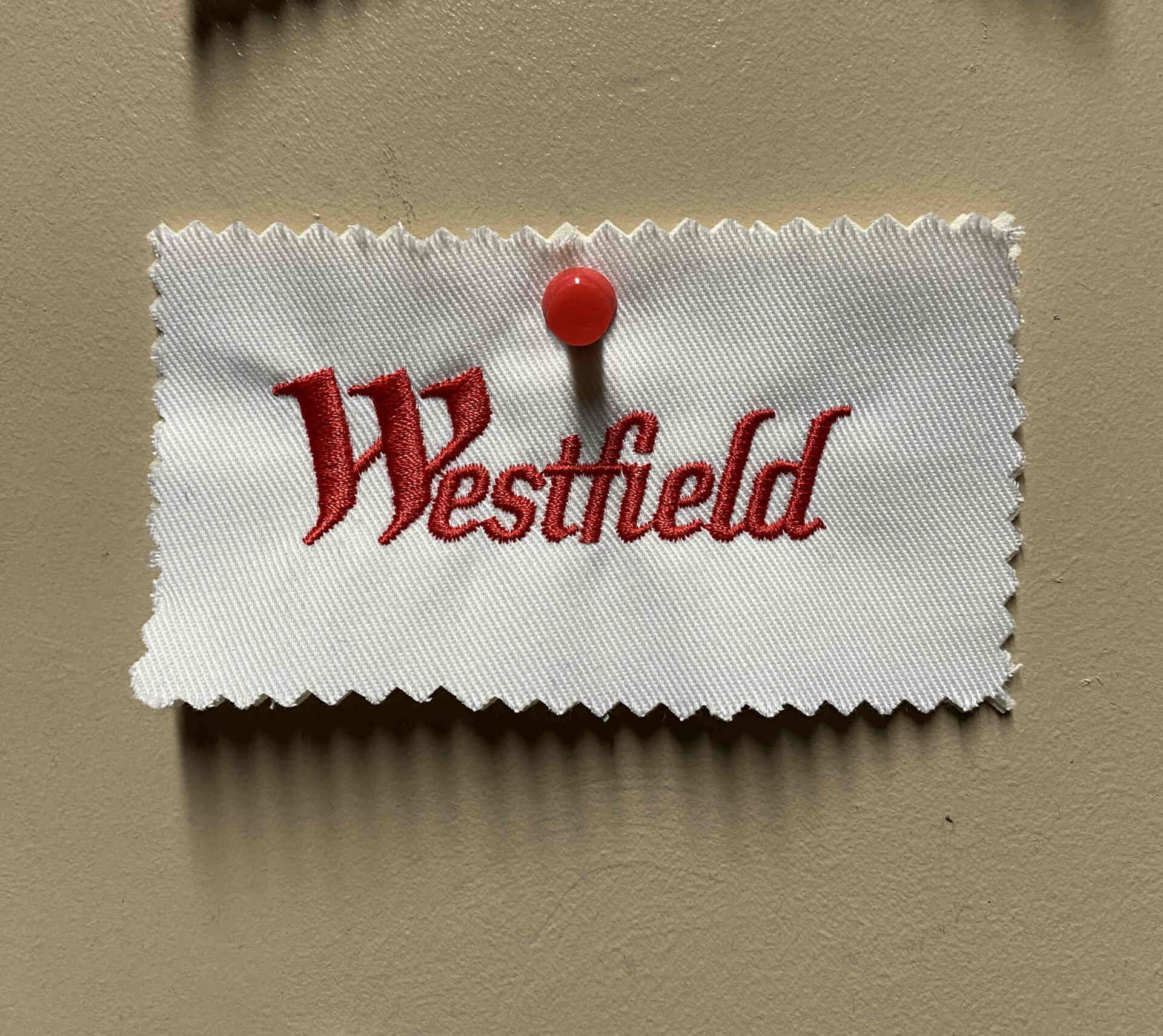Embroidered Westfield logo. 