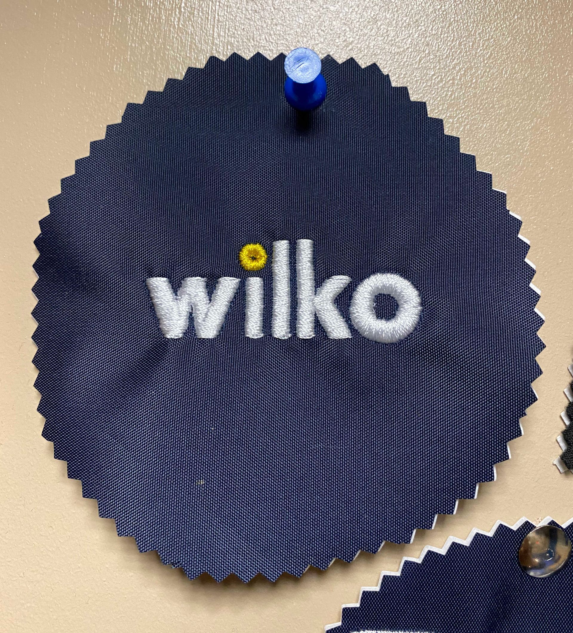 A navy blue fabric swatch with the 