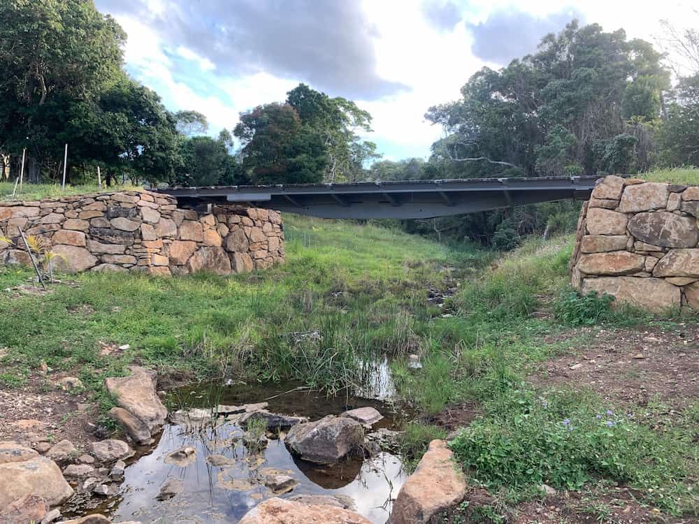 There Is A Bridge Over A Stream In The Middle Of A Field — J & M Bashforth & Sons In Brunswick Heads, NSW