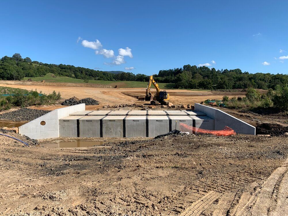 A Large Concrete Structure Is Being Built in A Dirt Field  — J & M Bashforth & Sons In Tweed Heads, NSW